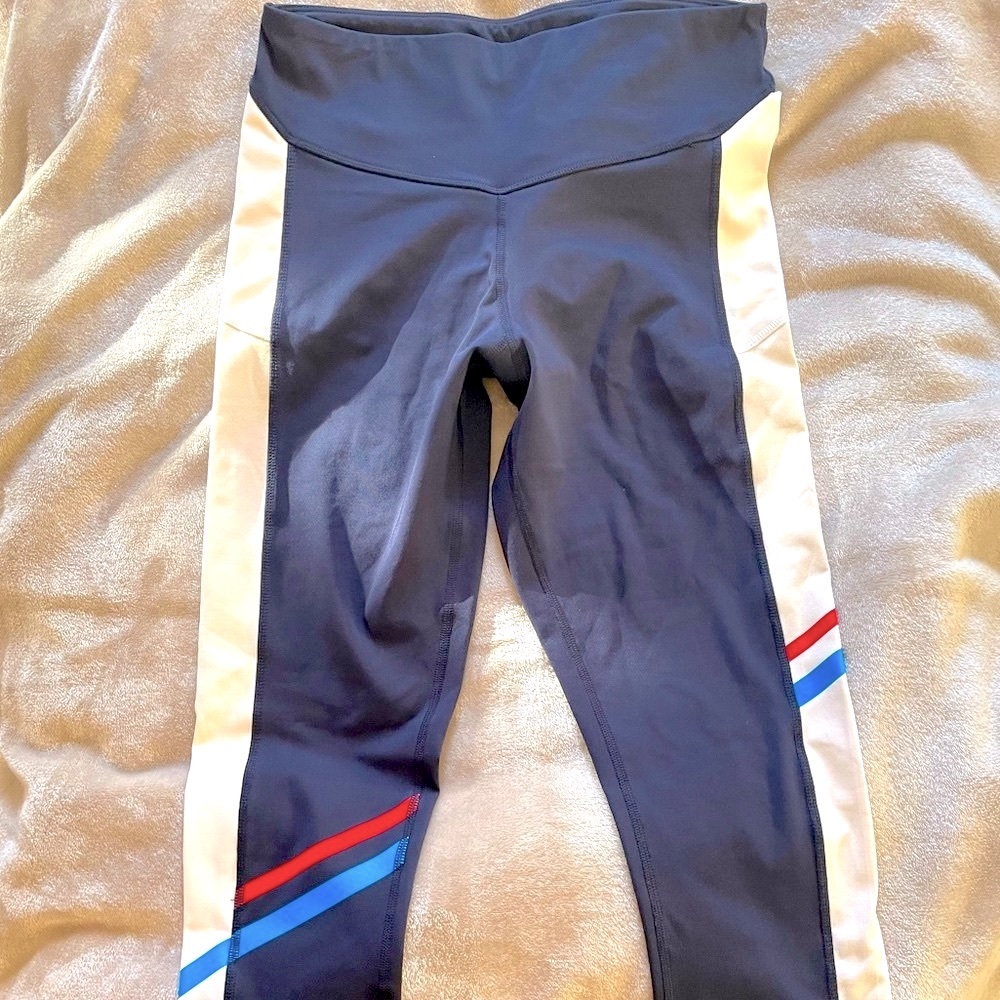 Champion 9 leggings with pockets on each side. Large. Dark blue and white.